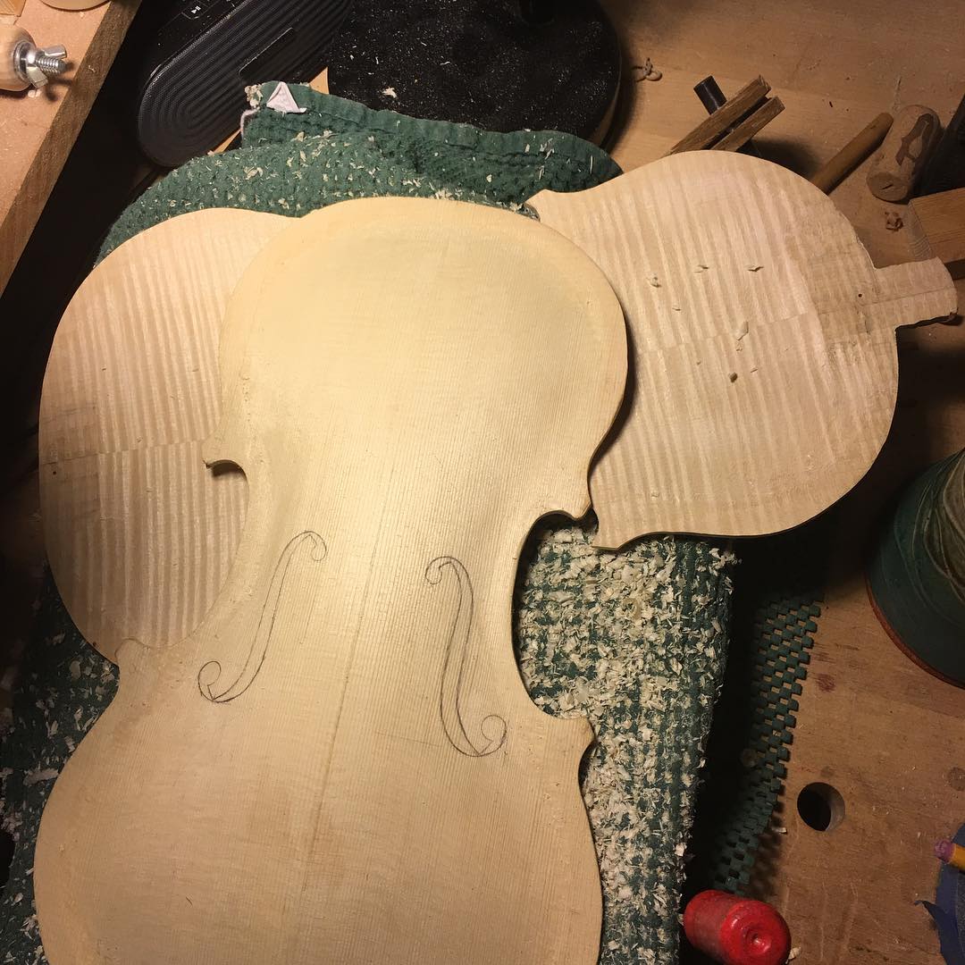 Violin Maude: sound holes drawn, now to reflect, remeasure, recheck the weight, tap tones, dimensions; then cut holes through the top of this beautiful spruce